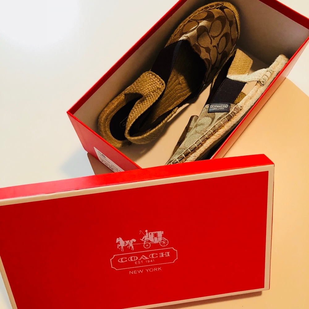 Coach slip ons with a back strap.